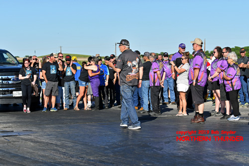 Outlaw Fuel Altered teams gathering behind the starting line